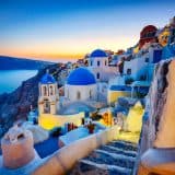 Santorini Greece blue and white buildings at sunset